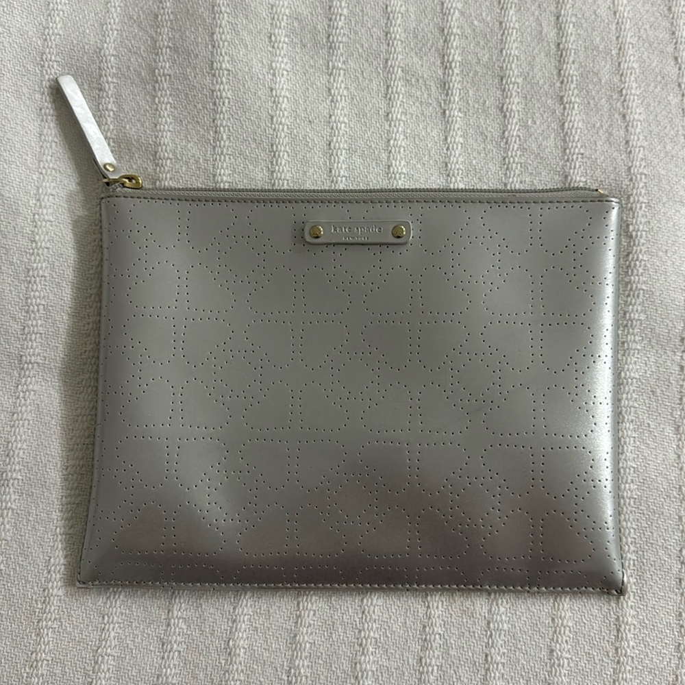 Silver clutch, like new.